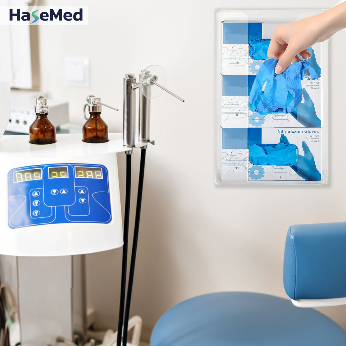 Acrylic HaseMed HAS-35 holder with spring for three glove boxes, shown during glove removal. One holder supplied. Gloves and boxes not included.